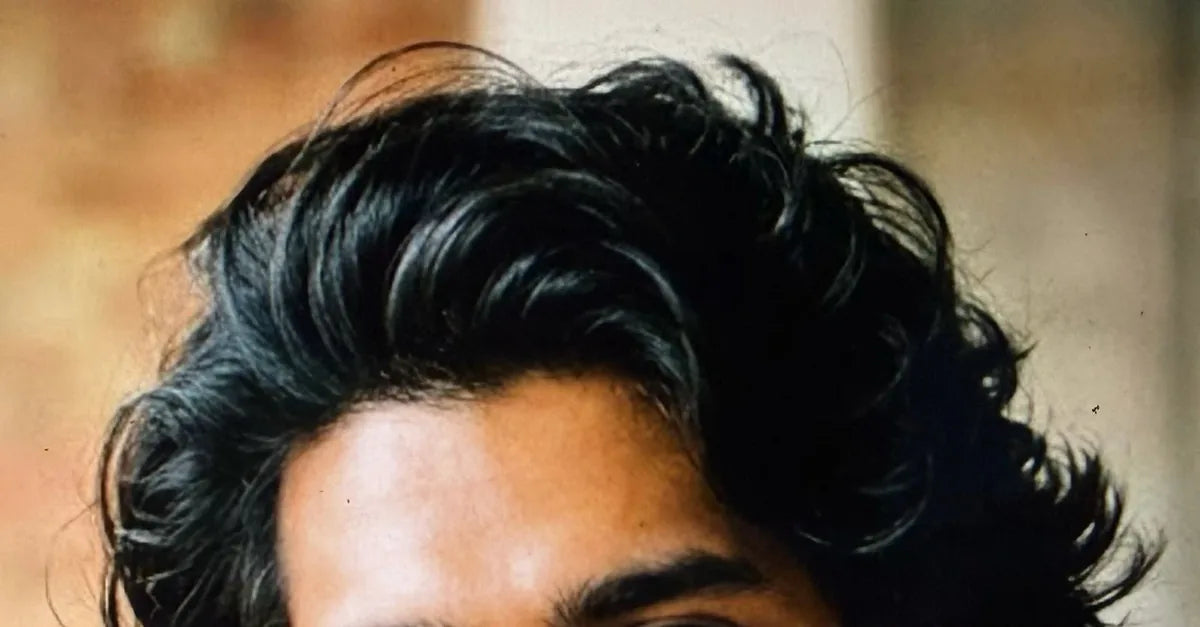 Model's fuller-looking hair after using Enigma