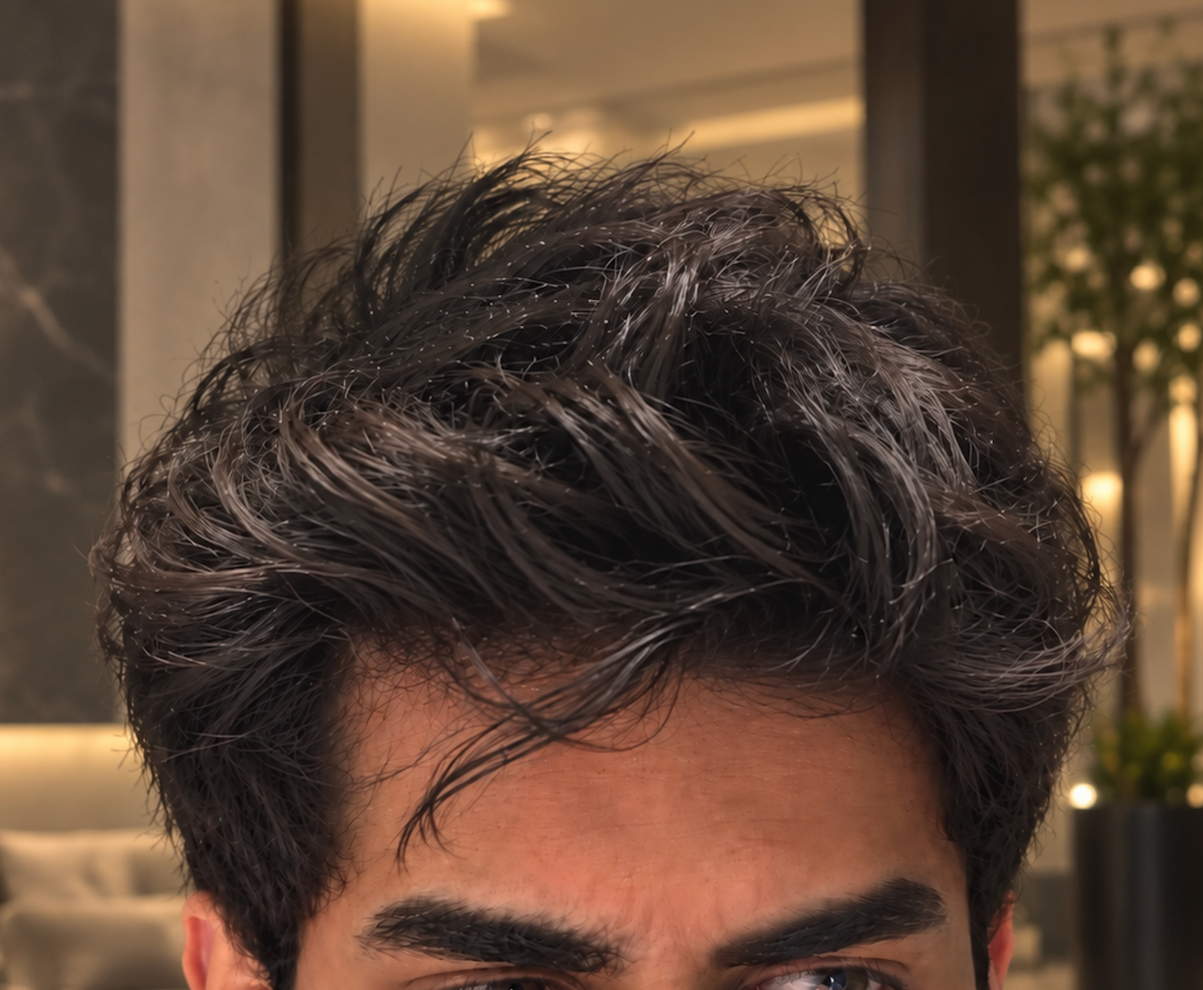 Model's fuller-looking hair after using Enigma